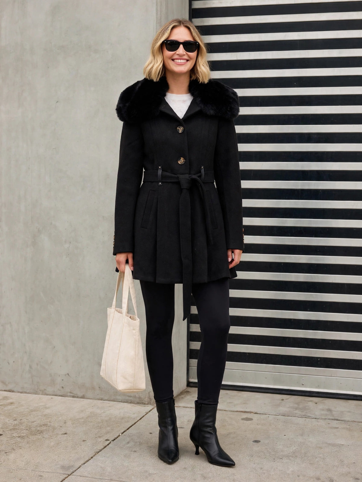 The Audrey Coat, black faux fur coat, front view
