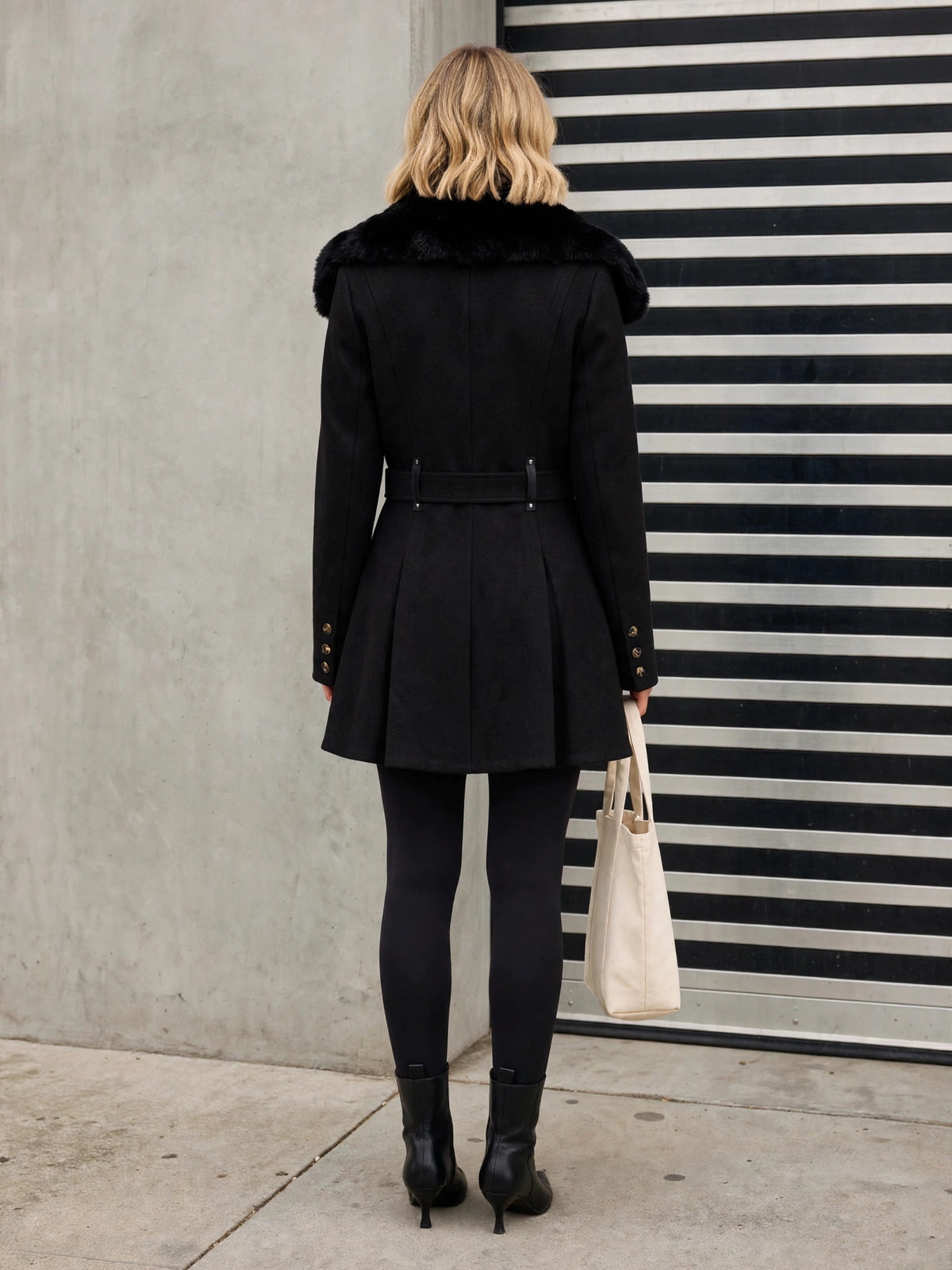 The Audrey Coat, black faux fur coat, back view